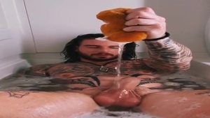 BWC Tatted Hunk Jerks Off In Tub